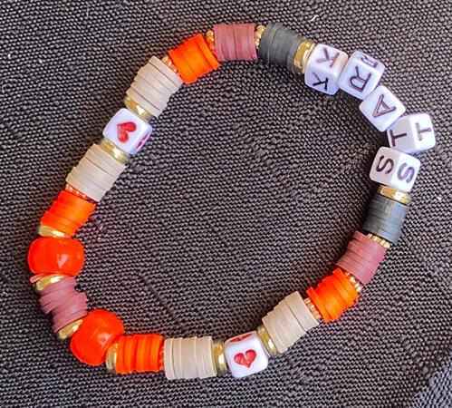 Bracelet in black, beige, brown, gold and red, inspired by Stark from Frieren: Beyond Journeys End.